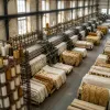 Dentelle de Calais-Caudry : l'atelier où la machine joue encore la partition du fil